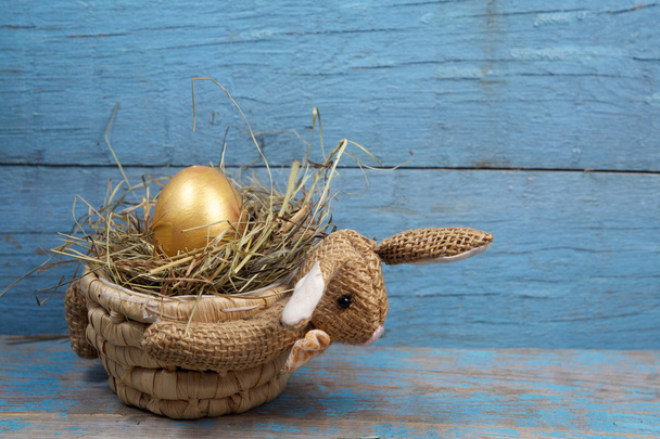 Rabbit-shaped basket with egg  - Foto, immagini