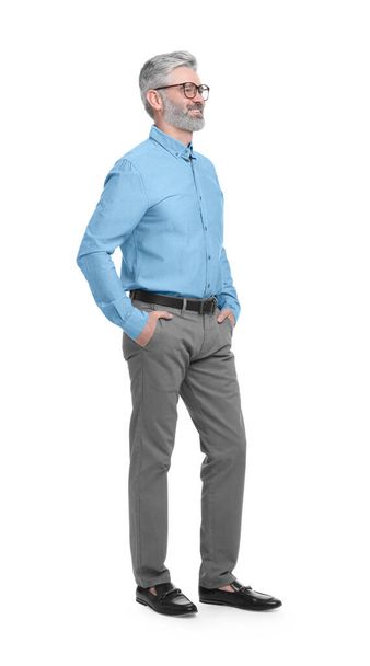 Mature businessman in stylish clothes posing on white background - Fotó, kép