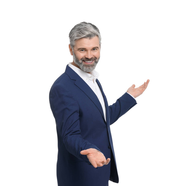 Mature businessman in stylish clothes posing on white background - Фото, изображение