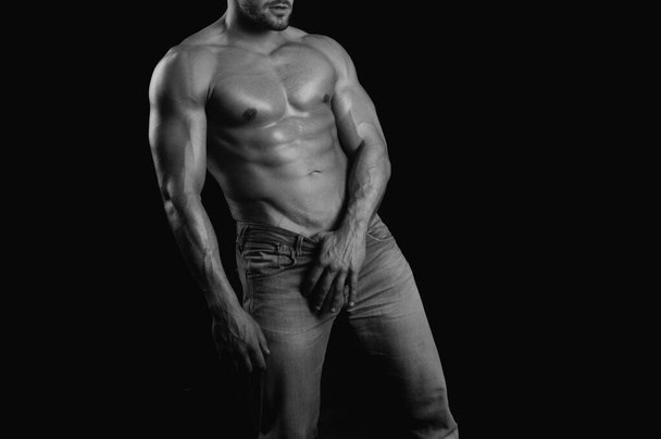 Hot boy. Muscular mans torso. Male flexing his muscles - Фото, изображение