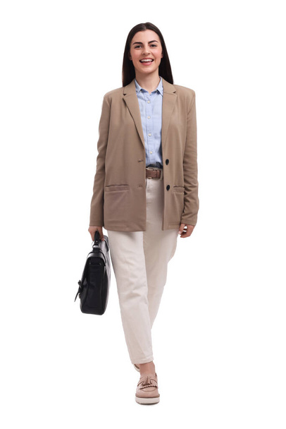 Beautiful happy businesswoman with briefcase walking on white background - Φωτογραφία, εικόνα