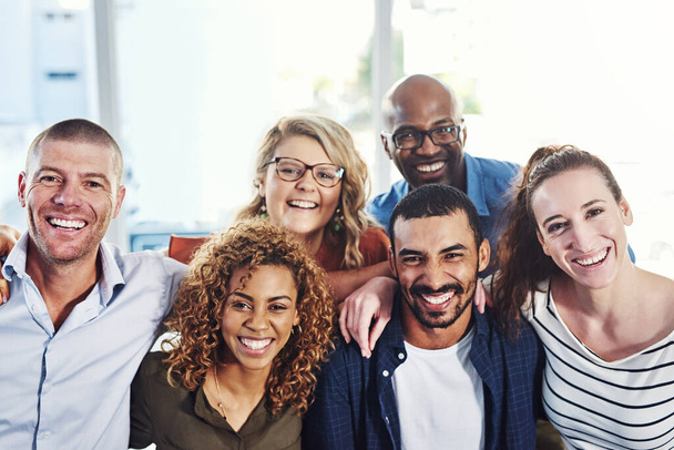 Happy people, business portrait and hug in a office with a smile from copywriter teamwork and collaboration. Diversity, happiness and writer staff together proud from motivation, trust and success. - Foto, Imagem