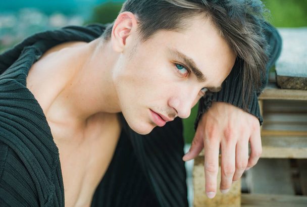 Close up portrait of young man. Sexy handsome male model. Beautiful eyes - Фото, зображення