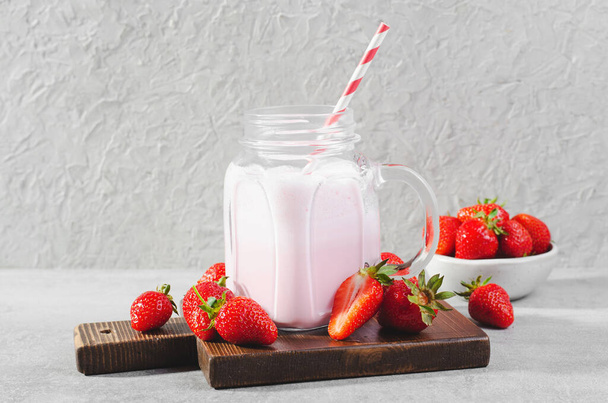 Strawberry Drink, Milkshake with Fresh Strawberry on Light Grey Background - Photo, Image