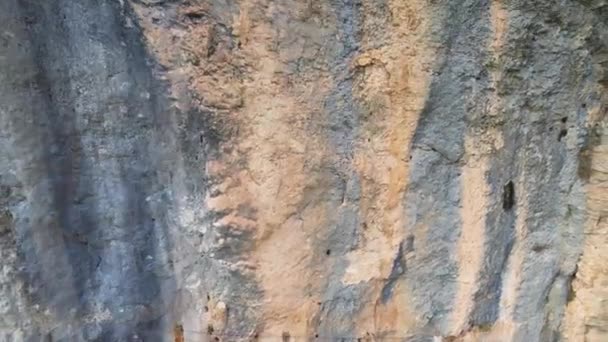 Panoramic beautiful vertiginous impressive aerial view from bottom to top of wooden staircase at rock cliff as part of hiking path in Congost de Montrebei gorge in Catalonia in Pyrenees,Spain.4K video - Footage, Video