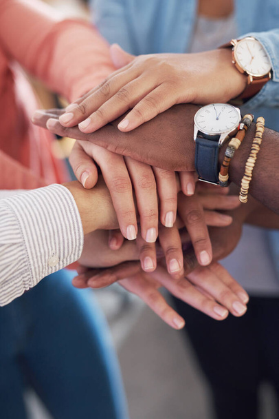 Hands together, team building and trust with diversity, collaboration and creative group at startup. Motivation, solidarity and support with teamwork, hand stack for a goal with people in community. - Foto, Bild