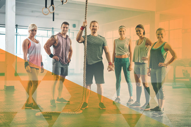 Group fitness, people and portrait at gym for exercise, workout and rope training. Personal trainer with happy men and women for power challenge, commitment or strong muscle at a club with a overlay. - Photo, Image