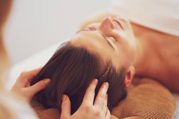 Woman having japan style face massage in salon. High quality photo - Fotografie, Obrázek
