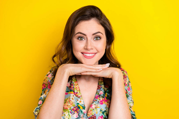 Photo of cheerful sweet woman dressed vintage flower print blouse arm chin smiling isolated yellow color background. - Fotografie, Obrázek