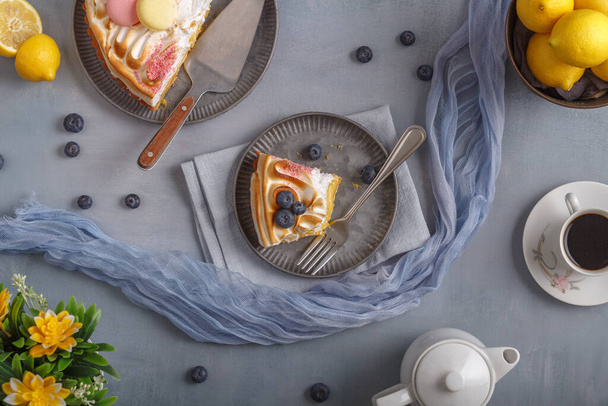 Lemon meringue pie with blueberries. Top view. Copy space - Fotoğraf, Görsel
