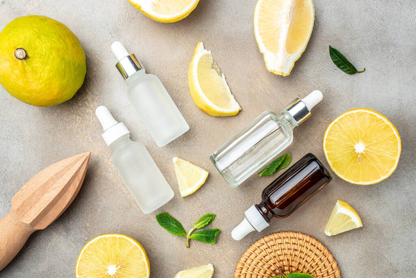 Bergamot citrus fruit essential oil, aromatherapy oil natural organic cosmetic. place for text, top view. - 写真・画像