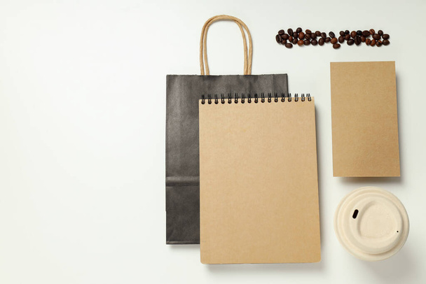 Mockup flat lay with craft accessories and coffee beans on white background - Foto, Imagen