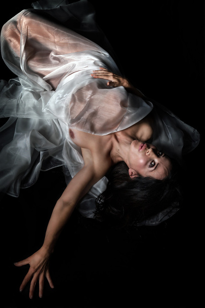 Naked woman lying in the veil - Photo, Image