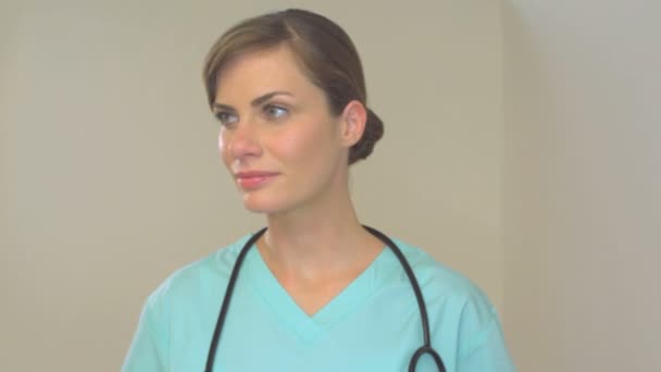 Portrait of female doctor with stethoscope - Filmagem, Vídeo