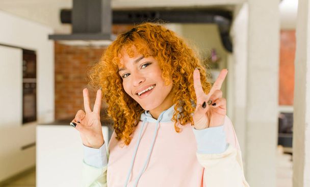 young red hair latin pretty womann at new cool home - Foto, Bild