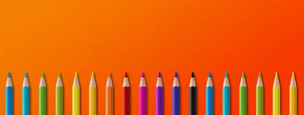 Wooden colored pencil set isolated on orange. Panoramic banner background. - Fotó, kép