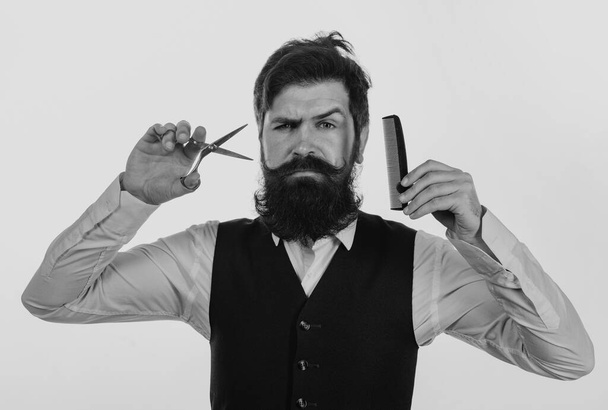 Bearded man, portrait of man with long beard and moustache. Barber scissors and comb for barber shop. Vintage barbershop, shaving - Zdjęcie, obraz