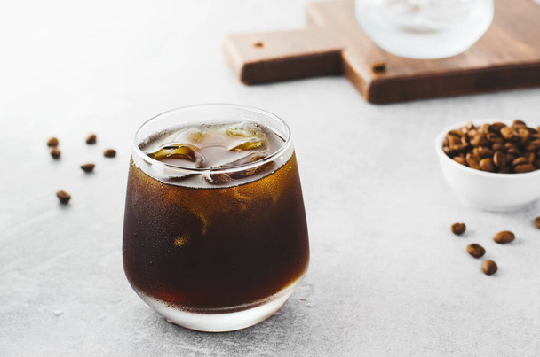 Iced Coffee, Cold Brew Coffee with Ice on Bright Light Grey Background, Refreshing Beverage - Photo, Image