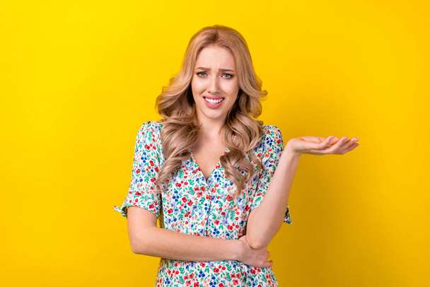 Portrait of dissatisfied lady speaking chatting friends discuss weird proposition dont agree isolated on yellow color background. - Photo, image