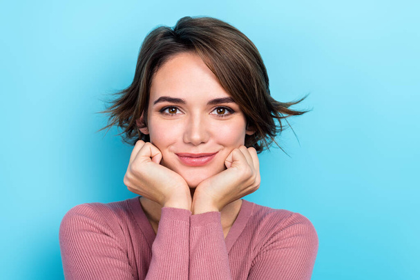 Portrait of adorable positive lady hands touch cheeks empty space ad isolated on blue color background. - Фото, изображение