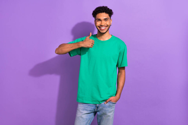 Portrait of funny excited young guy youngster raise thumb finger up approve agree appoint isolated purple color background. - Fotoğraf, Görsel