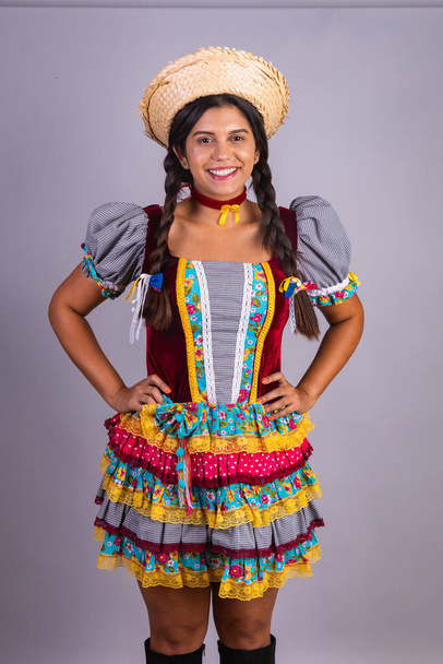 Brazilian woman, clothes from festa junina, arraial, festa de so joo. Vertical portrait - Foto, Imagem