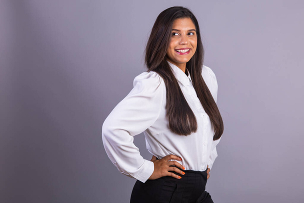 Brazilian businesswoman, manager, corporate portrait. hands on waist. - Φωτογραφία, εικόνα