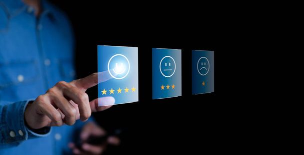Customer review satisfaction feedback survey concept. Businessman choosing on the happy Smile face icon to give satisfaction in service, rating very impressed. review, positive feedback, best quality, - Valokuva, kuva