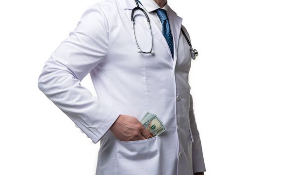 cropped photo of doctor taking bribe money. doctor take bribe isolated on white. doctor taking bribe in studio. doctor takes bribe on background. - Fotoğraf, Görsel
