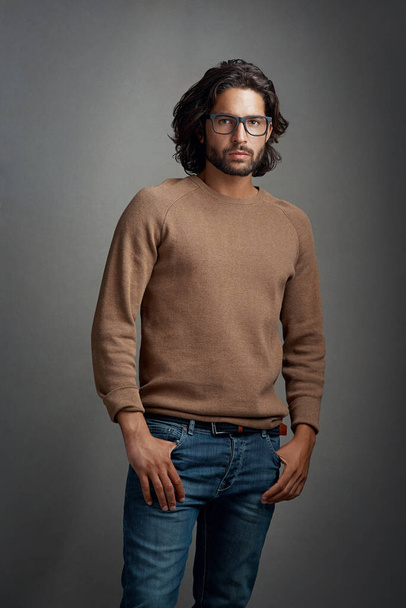 Glasses, portrait and serious man in studio isolated on a gray background. Face, spectacles and handsome male person from Brazil with eyewear or frames for fashion, stylish and aesthetic mockup - Valokuva, kuva