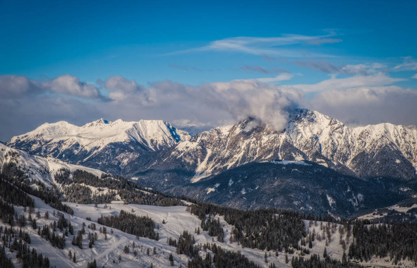 Mountain ski resort Nassfeld near Hermagor, Austria - morning view of well prepared slopes with no people. January 2022 - Φωτογραφία, εικόνα