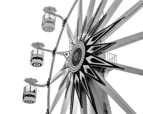 Photograph of the Ferris wheel ride, located in Sunset Park La Libertad, El Salvador. built by president nayib bukele. black and white - Photo, Image
