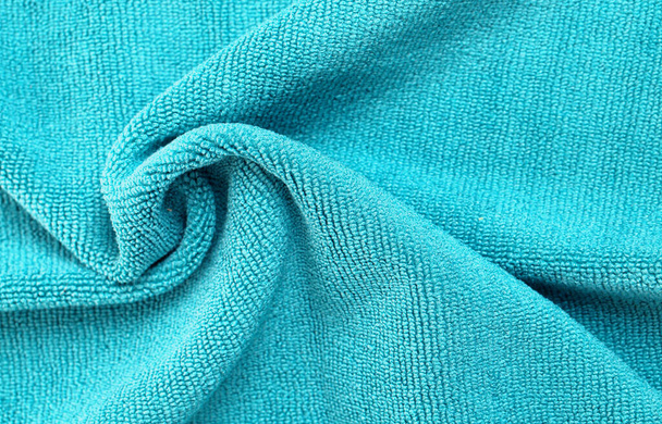 Морщинистая голубая ткань микроволокна текстура полотенце крупным планом
 - Фото, изображение