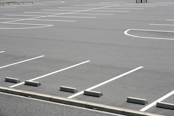 Road marking on the asphalted parking place                                 - Photo, Image