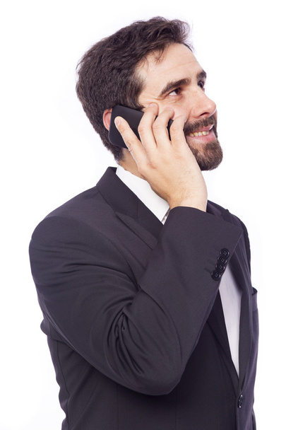 Business man talking on the phone - 写真・画像