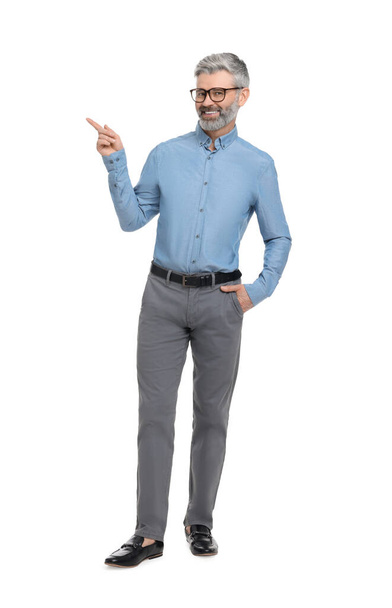 Mature businessman in stylish clothes posing on white background - Zdjęcie, obraz