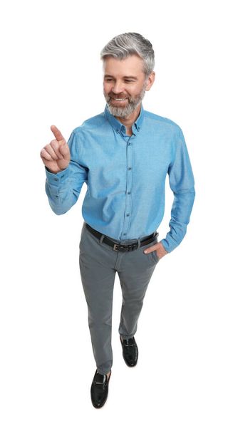 Mature businessman in stylish clothes posing on white background - Foto, Imagen