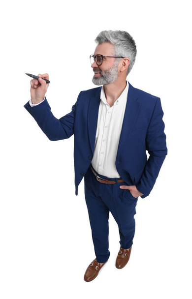 Mature businessman with marker on white background, above view - Photo, Image