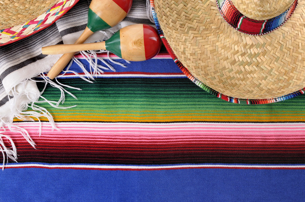 Mexican background with traditional blanket and sombrero - Foto, afbeelding