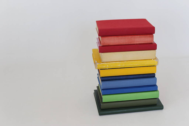 stack of different books on wooden table_education concept - Photo, Image