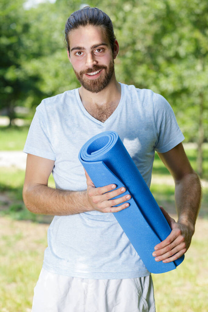 jogging active man after yoga training - Photo, Image