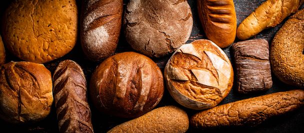 Different types of bread. Macro background. High quality photo - Foto, Imagem