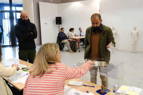 Voters cast their ballots at a polling station during the Greek legislative election at a polling station in Brussels, Belgium on May 20, 2023. - Foto, Imagem