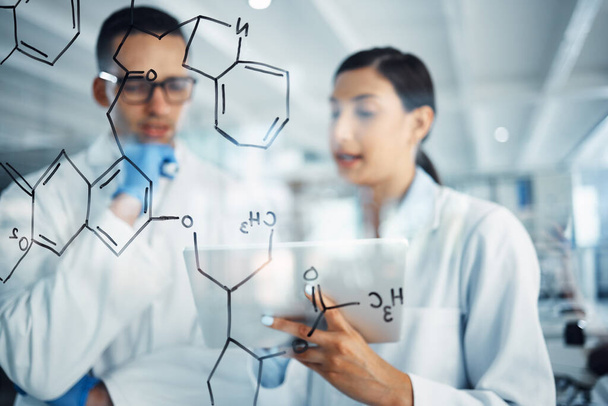Science, tablet and man and woman with chemistry equation for medical research, formula and solution. Healthcare, teamwork and male and female scientist thinking, planning and strategy in laboratory. - 写真・画像