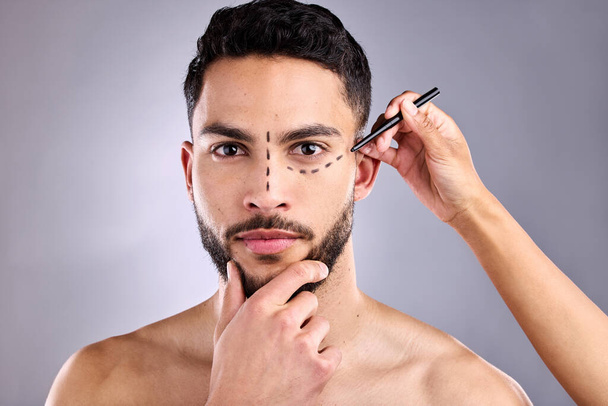 Face, man and plastic surgery marker for cosmetics in studio isolated on a white background. Facial, operation lines and beauty of male model, dermatology or skincare for serious rhinoplasty portrait. - Foto, imagen