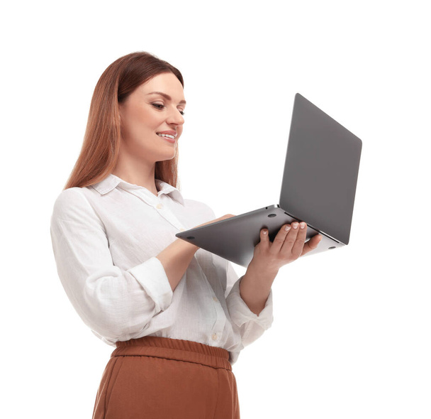 Beautiful businesswoman with laptop on white background, low angle view - Fotoğraf, Görsel