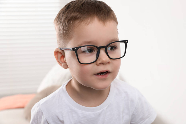 Cute little boy in glasses at home - Zdjęcie, obraz