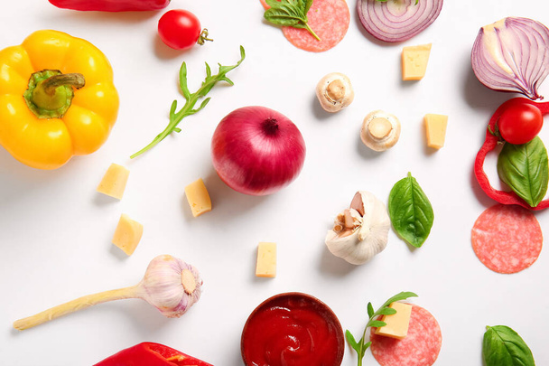 Ingredients for preparing pizza on white background - Photo, Image