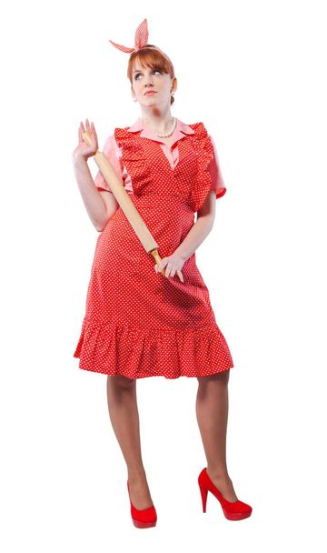 Confident happy vintage style woman holding a rolling pin and posing, full-length - Foto, Imagem