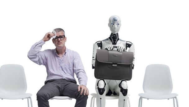 Stressed anxious man and robot sitting in the waiting room, they are waiting for a job interview, copy space - Foto, Imagen